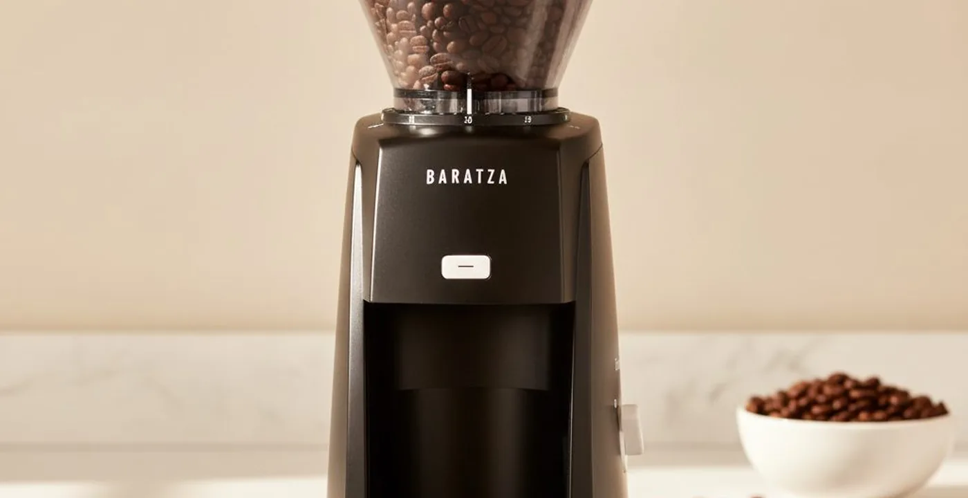 Baratza Encore ESP grinder on kitchen worktop with espresso machine in background