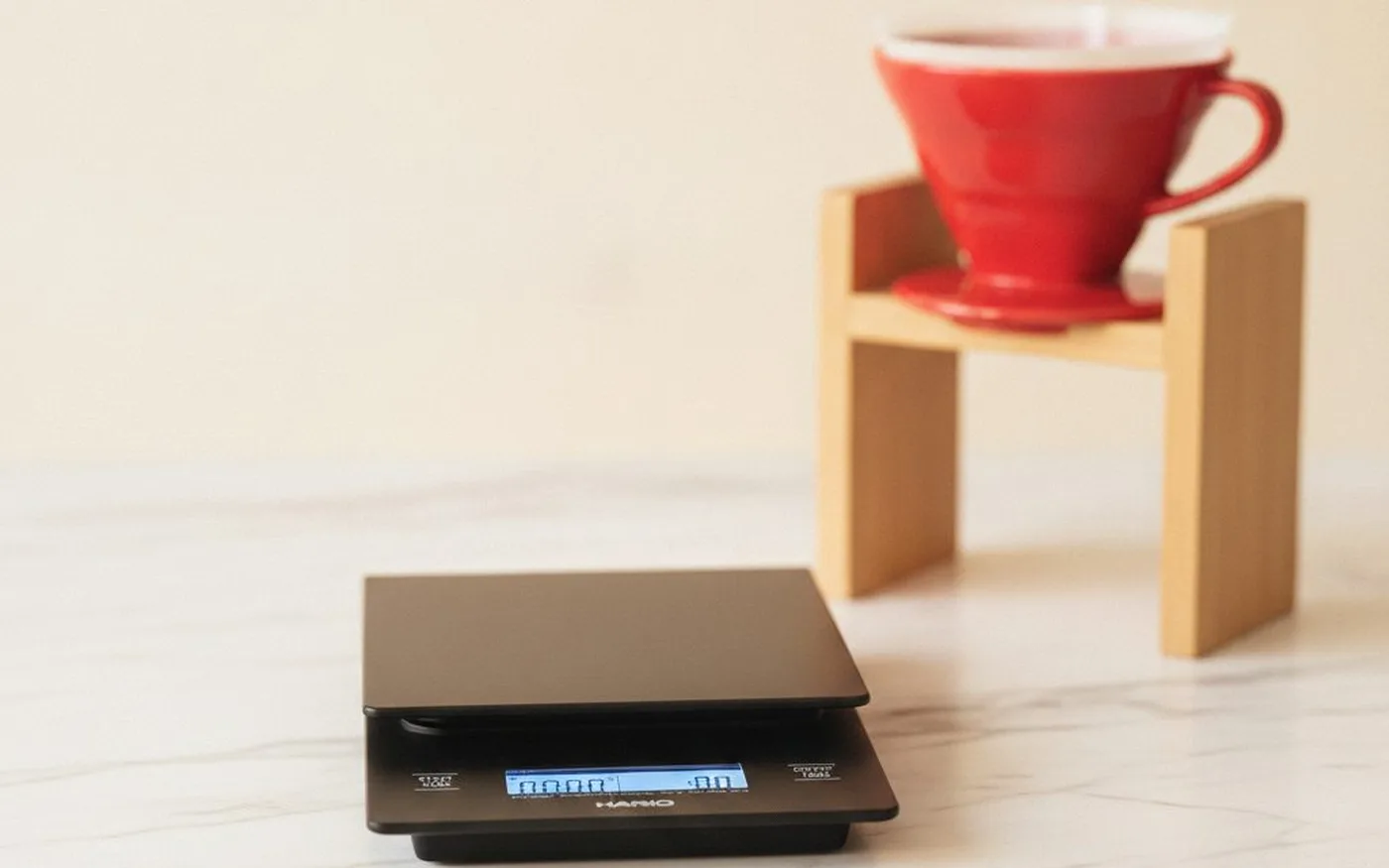 Hario V60 Drip Scale and Timer with a V60 dripper on a kitchen bench