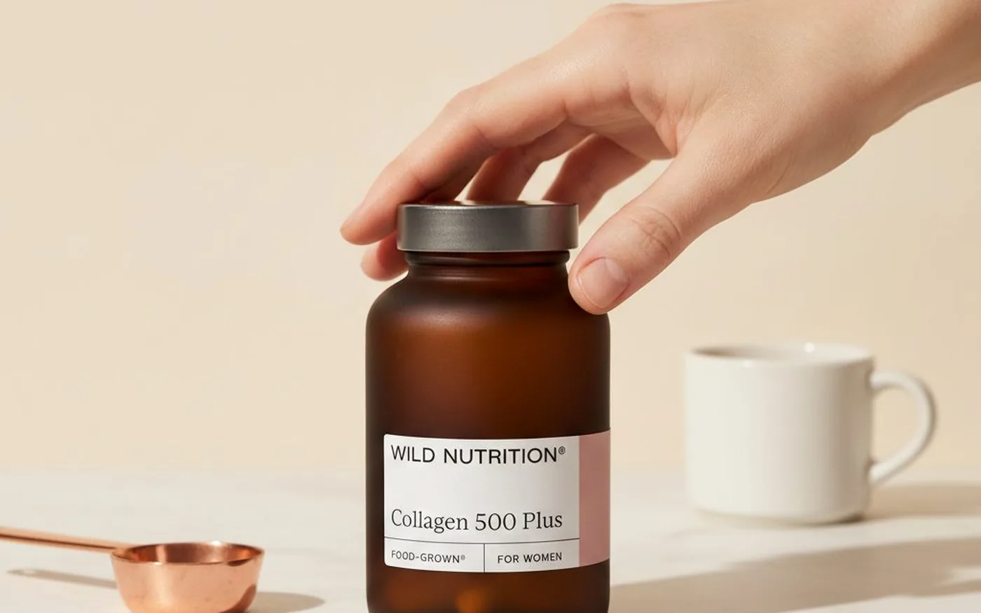 Wild Nutrition Grass-Fed Collagen powder in amber bottle