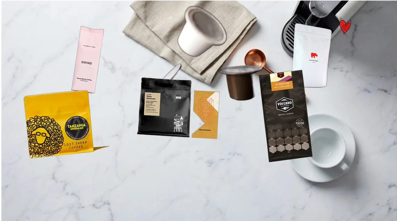 Best eco-friendly coffee pods UK 2026 - compostable and sustainable coffee pod brands arranged on white marble