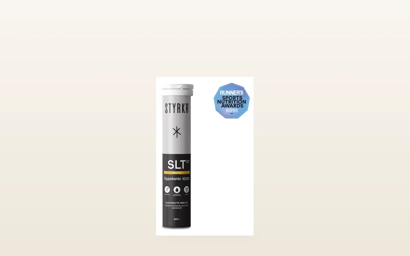 Styrkr SLT07 electrolyte tablets next to a triathlon bike