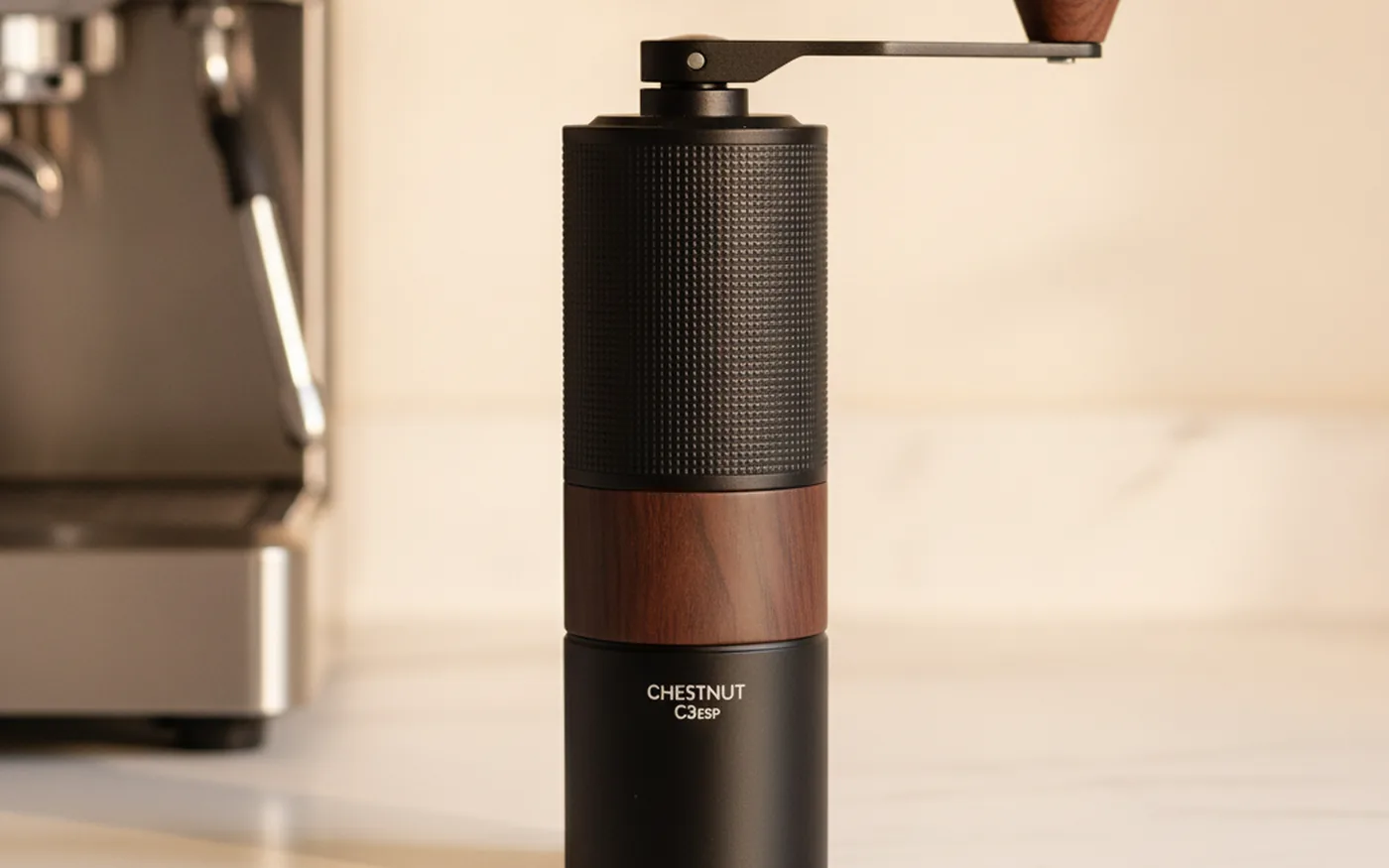 Timemore Chestnut C3 ESP grinder on wooden surface with coffee