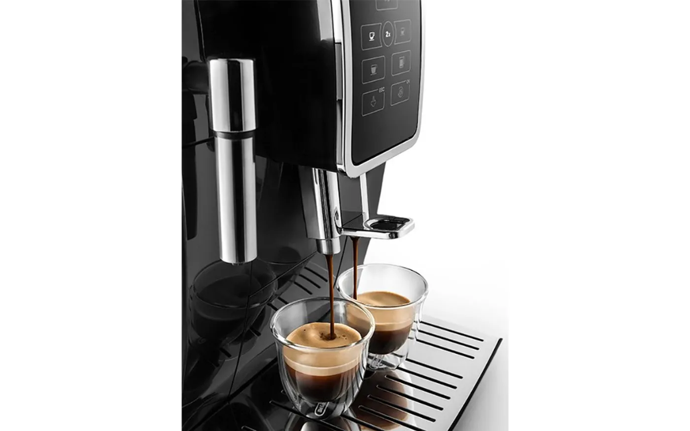 Espresso being dispensed from the De'Longhi Dinamica into two double-walled glasses