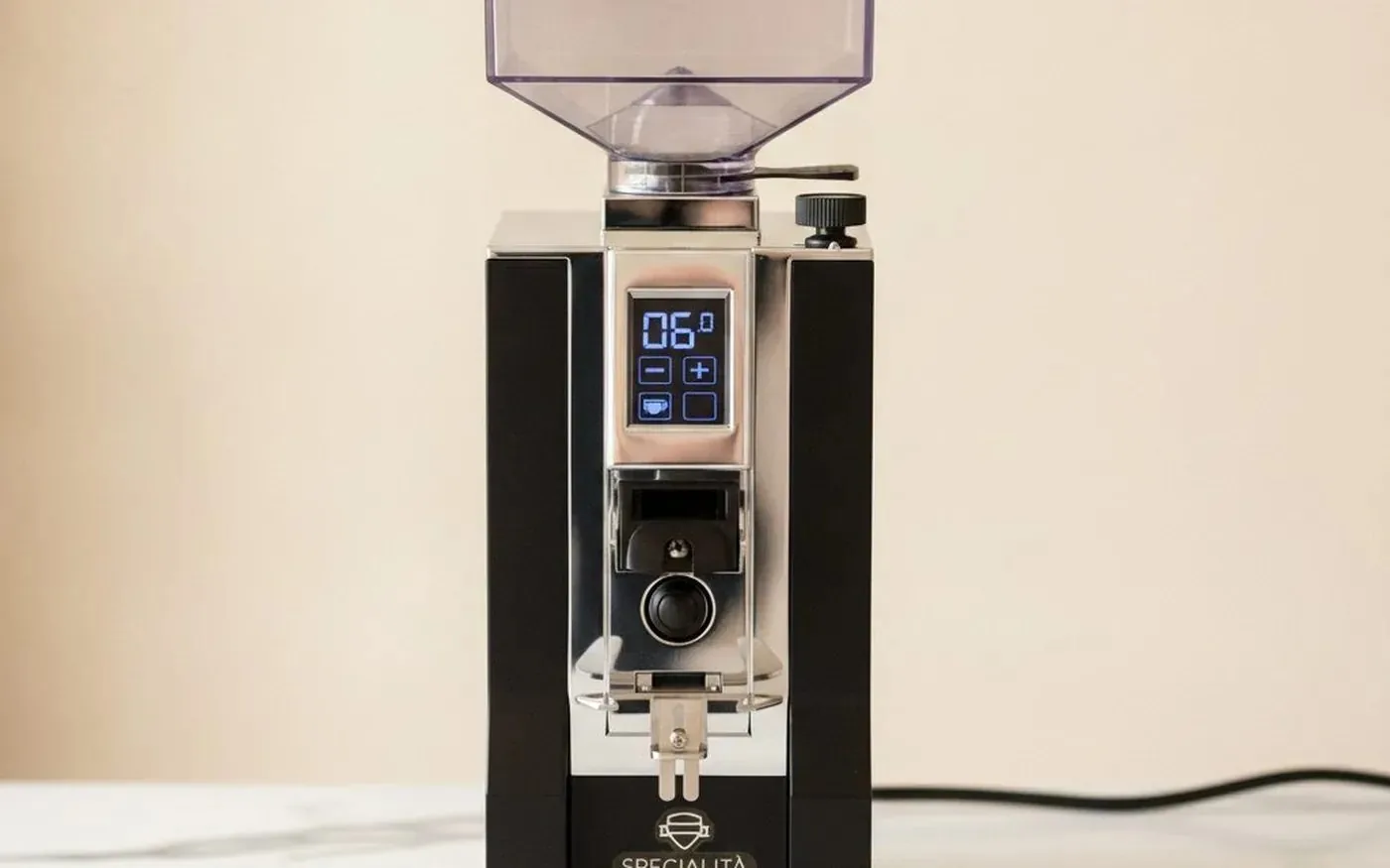 Eureka Mignon Specialita grinder on marble countertop