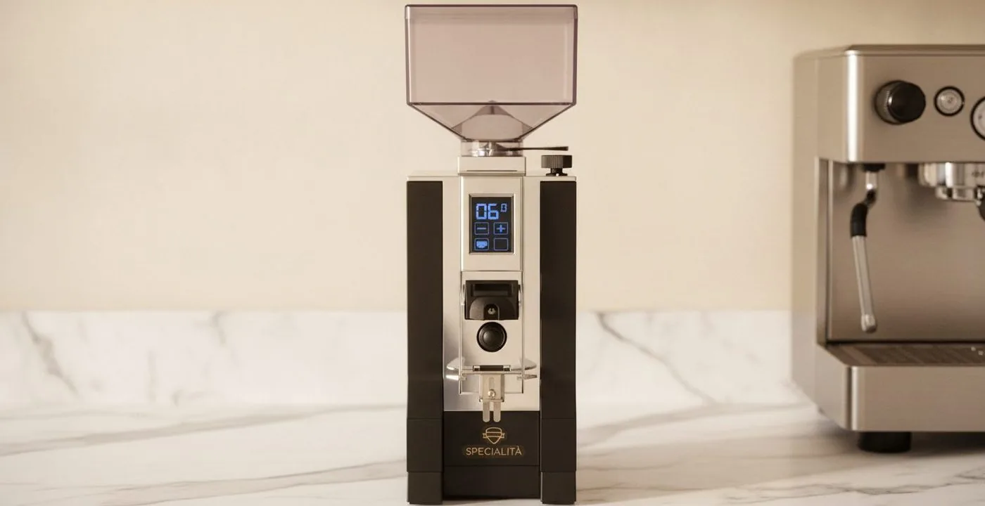 Eureka Mignon Specialita grinder on a kitchen counter beside a Gaggia Classic Pro