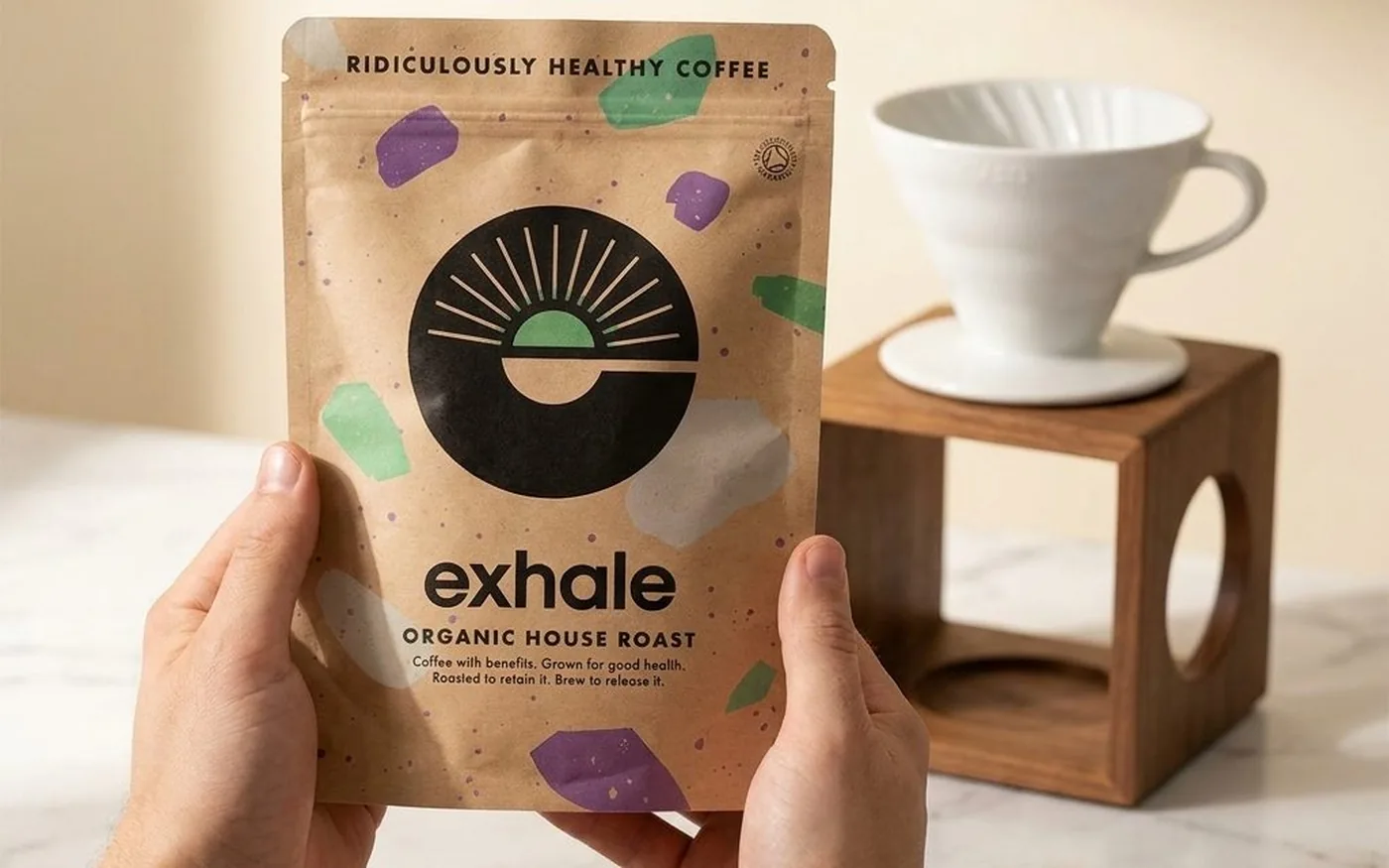 Exhale Coffee Organic House Roast bag on white marble countertop with V60