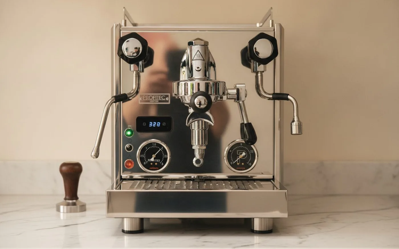 Profitec Pro 700 stainless steel E61 dual-boiler espresso machine with PID display on white marble