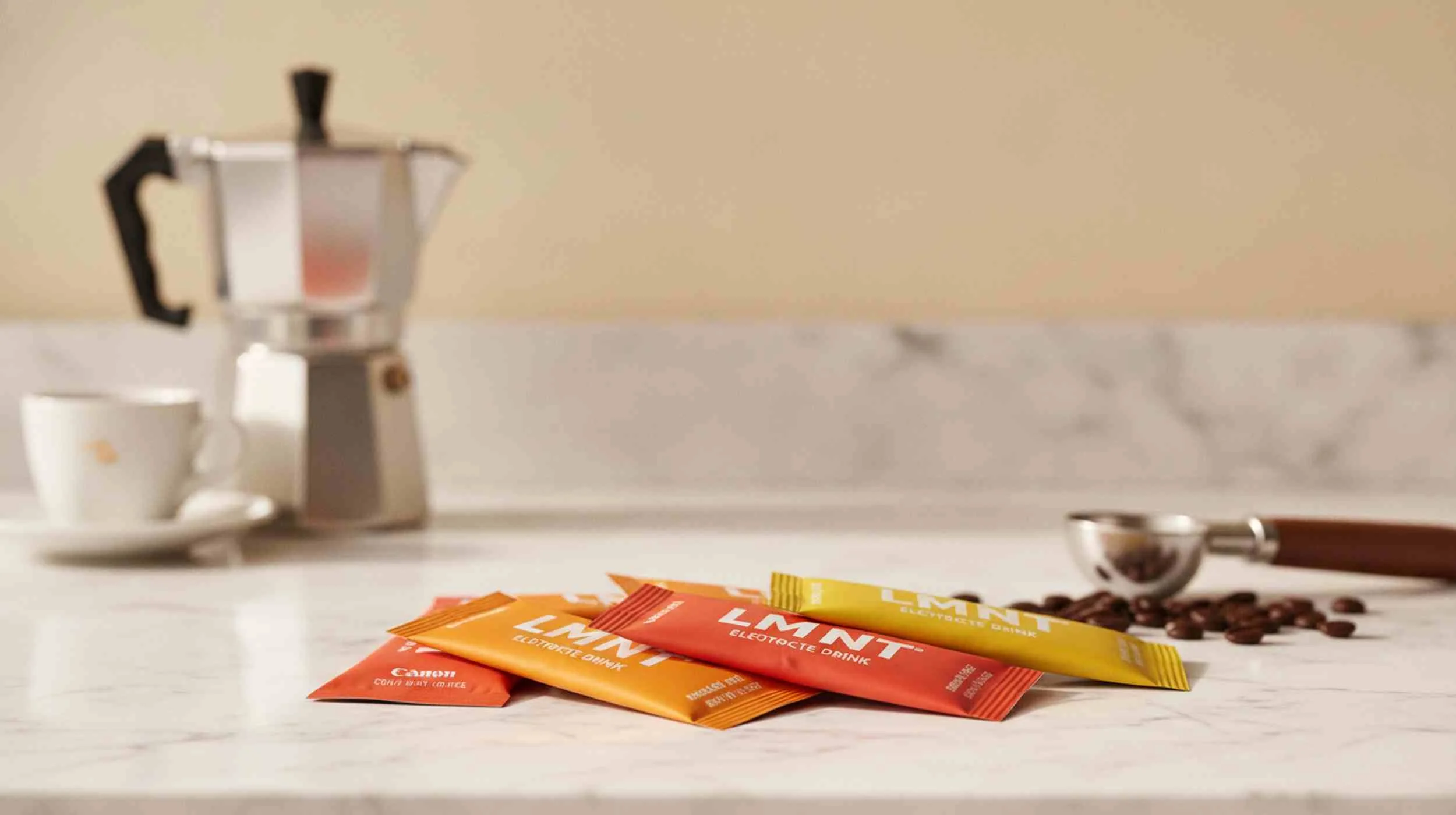 LMNT electrolyte drink sachets and sticks on a marble surface — LMNT Review UK 2026