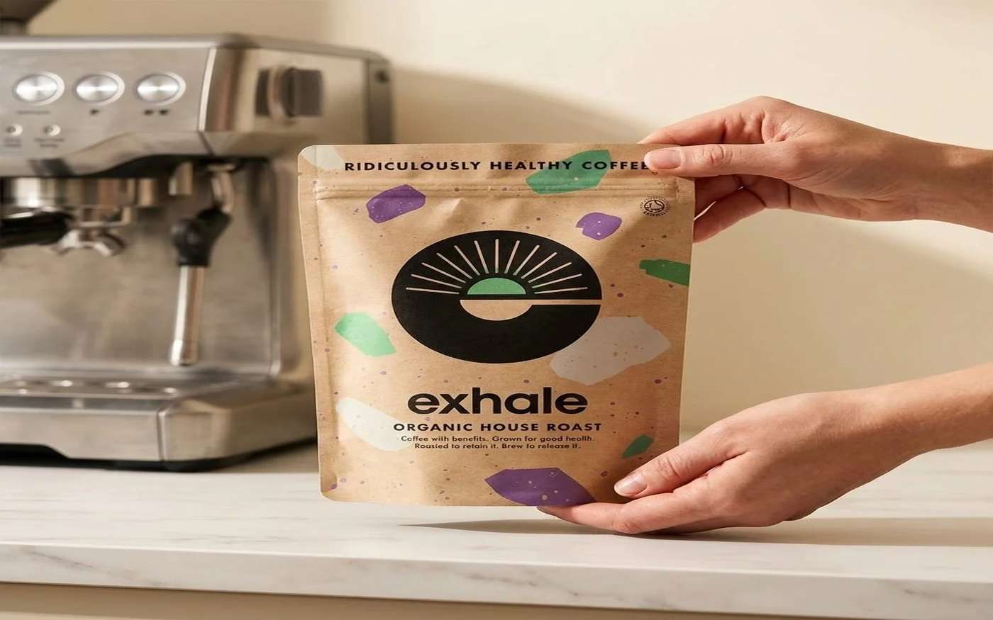 Exhale Coffee organic house roast bag on white marble surface