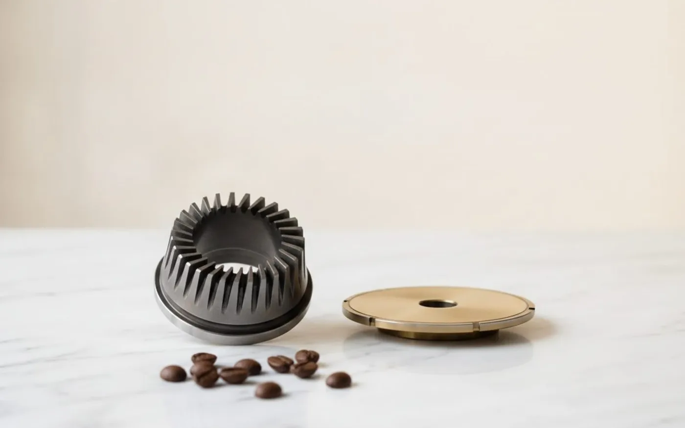 Conical burr and flat burr comparison on white marble - 63mm conical vs 55mm flat titanium-coated