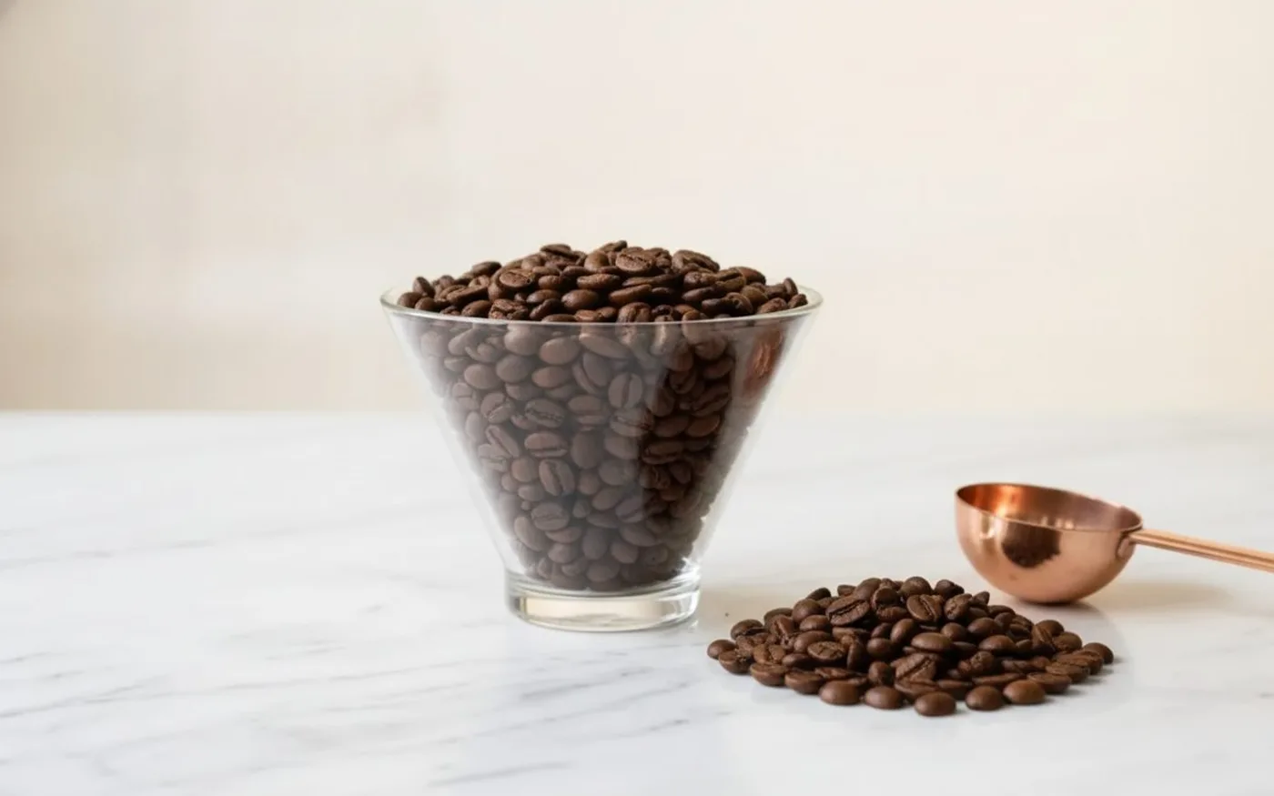 Coffee grinder hopper filled with whole roasted coffee beans showing hopper-fed vs single-dose workflow