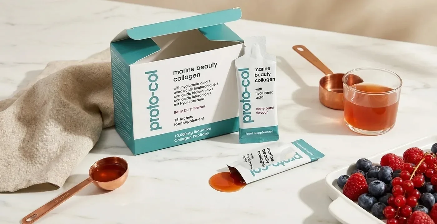 Proto-col Marine Beauty Collagen sachets and capsules arranged on a clean surface