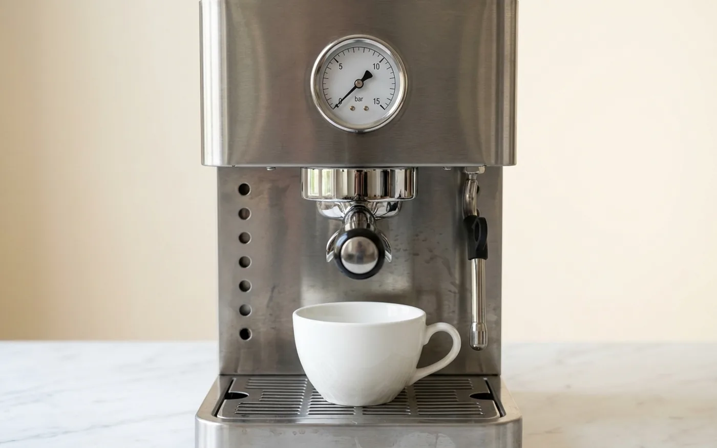 The Rocket Appartamento's analogue pressure gauge on the brushed stainless steel front panel