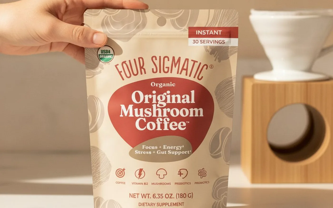 Four Sigmatic Original Mushroom Coffee bag on white marble with V60 dripper